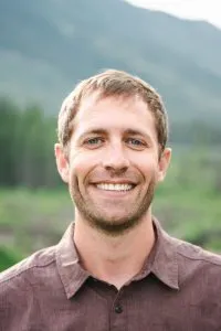 Dr. Ryan Oetken smiling outdoors